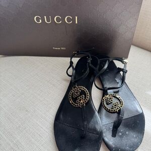 Gucci Black Leather Sandal with Gold Interlocking G Medallions